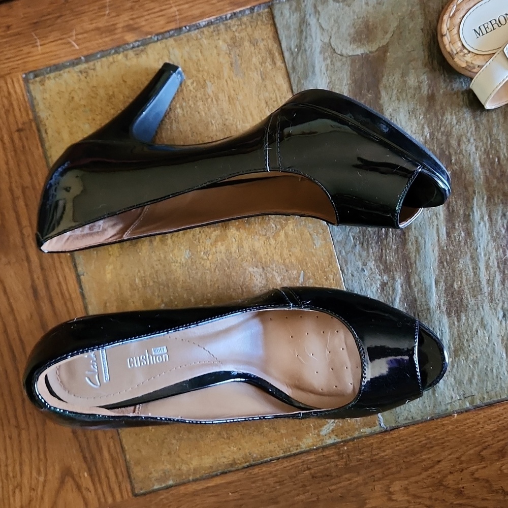Black Clark's peep toe pumps
